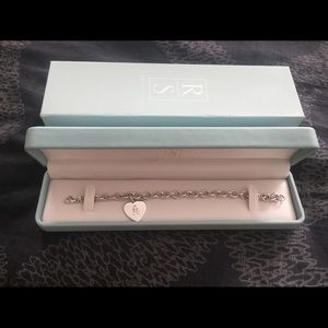 Sterling silver bracelet with engraved heart charm